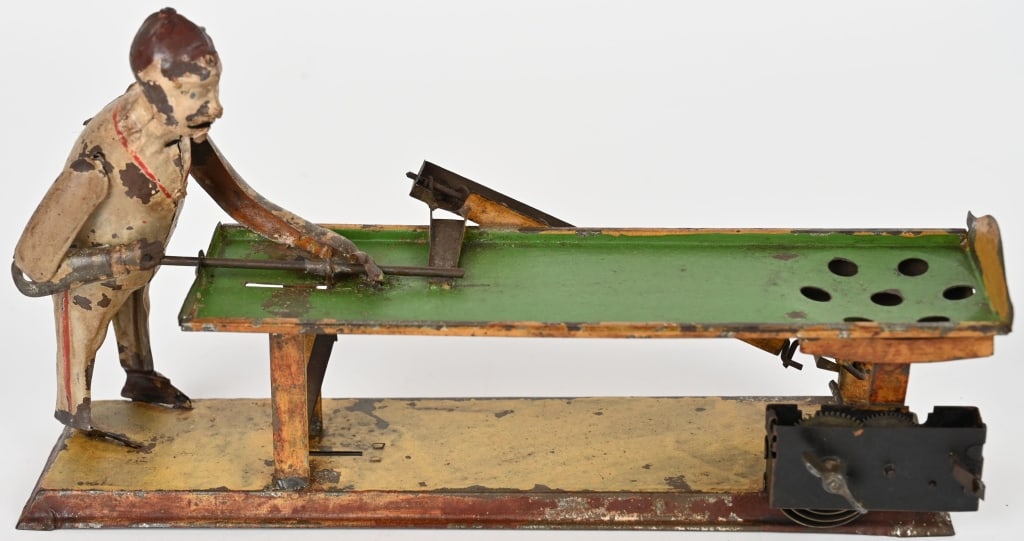 GUNTHERMANN BILLIARDS PLAYER: German hand painted tin windup Billiards Player. All original with decent paint. Windup works. 11" Very Good-Excellent