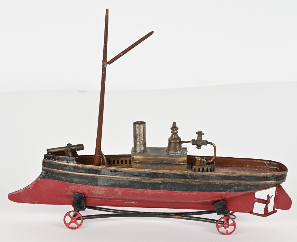 RADIGUET LIVE STEAM SINGLE MAST BATTLESHIP: Radiguet live steam Single Mast Battleship. Very scarce original boat. Original paint that has been shellaced. Has on cannon of bow. Steam engine looks to be complete. Rudder has been replaced. Scarce