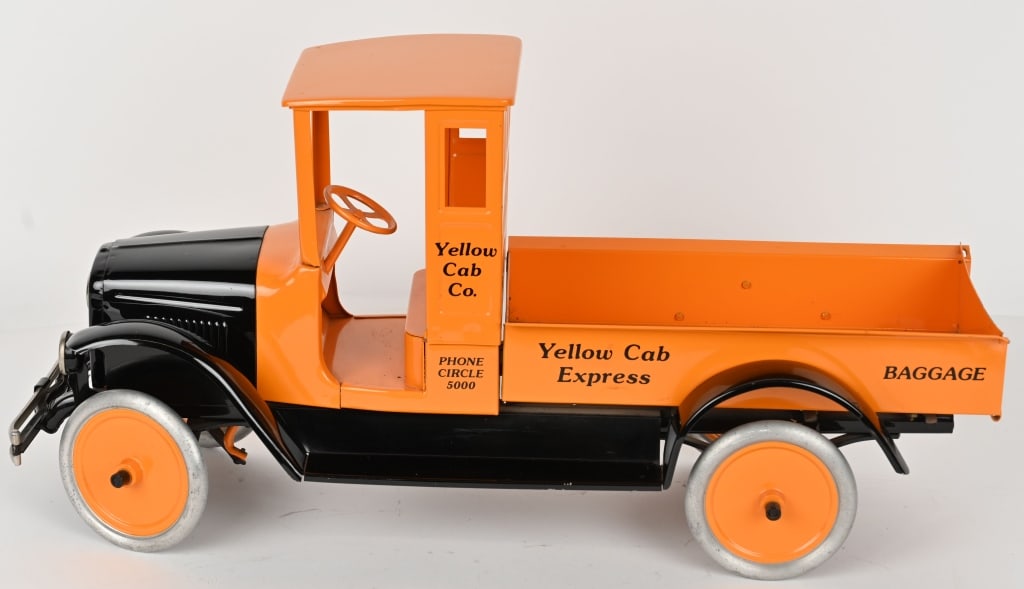 BUDDY L YELLOW CAB EXPRESS TRUCK: Buddy L pressed steel Yellow Cab Express Truck. Professionally custom restoration. Very well done. Truck has bumper and headlights. Bumper slightly pushed in but doesn't take from the truck. A great l