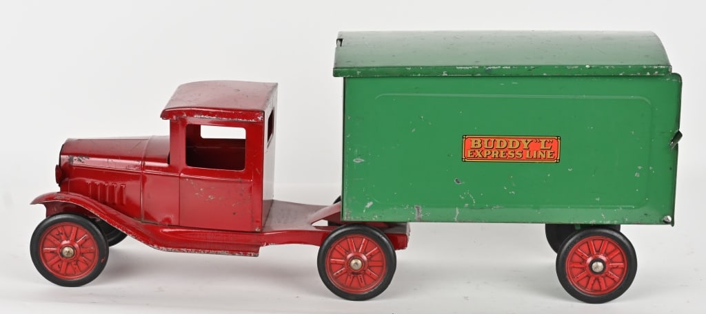 BUDDY L PRESSED STEEL EXPRESS LINE SEMI TRUCK: Buddy L pressed steel Express Line Semi Truck. All original and complete. Has removable top on trailer and tailgate. Paint and decals in nice shape. 23" Excellent