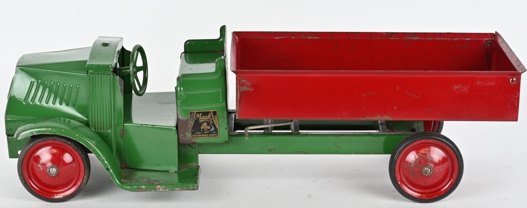 STEELCRAFT BULLDOG MACK DUMP TRUCK: Steelcraft pressed steel Bulldog Mack Dump Truck. Open cab version. All original with nice paint and decals. Steering wheel has been reattached. Very nice looking truck. 23" Excellent