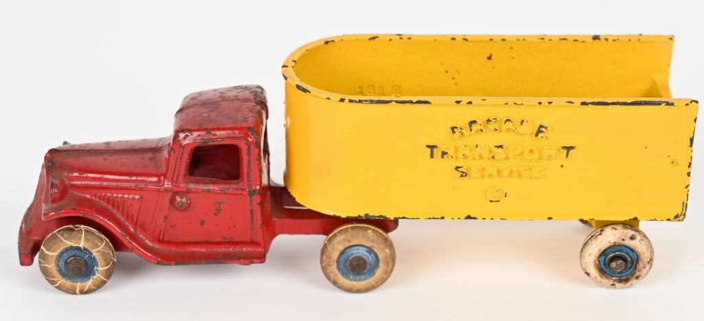 ARCADE CAST IRON TRANSPORT SERVICE TRUCK: Arcade cast iron Transport Service Truck. All original with no breaks or repairs. Has very nice paint. Hard truck to find. 7 1/4" Excellent