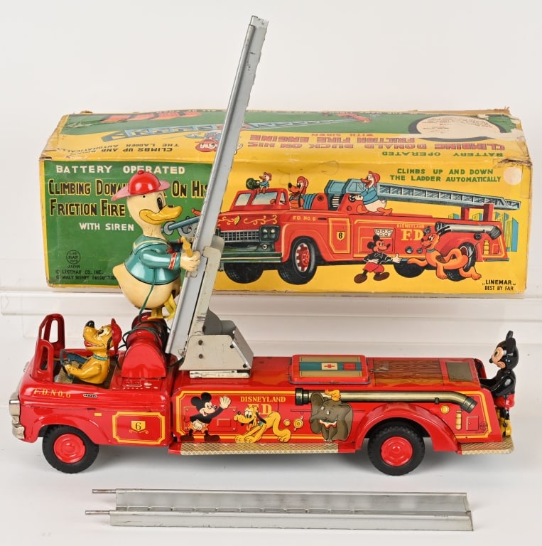 LINEMAR CLIMBING DONALD DUCK FIRE ENGINE w/ BOX: Linemar Donald Duck Fire Engine. A rare and impressive Disney Toy! Battery operated Donald Duck Fireman climbs the ladder on tin friction Fire Engine. Toy is all original and complete with Mickey Mous