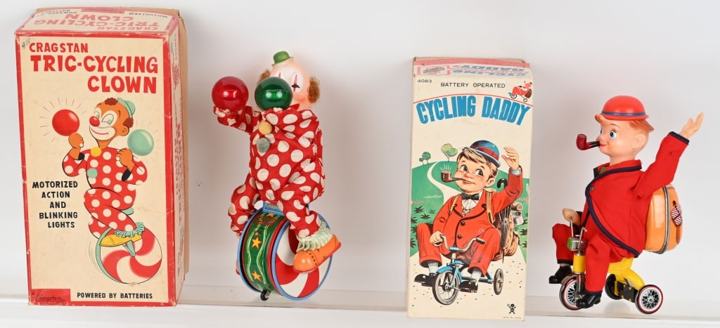 2- BATTERY OP TOYS, CYCLING DADDY & CLOWN w/ BOX: Lot includes: Cragstan Tri-Cycling Clown, along with Cycling Daddy. Both have original boxes and worked when tested. Largest is 10" Excellent