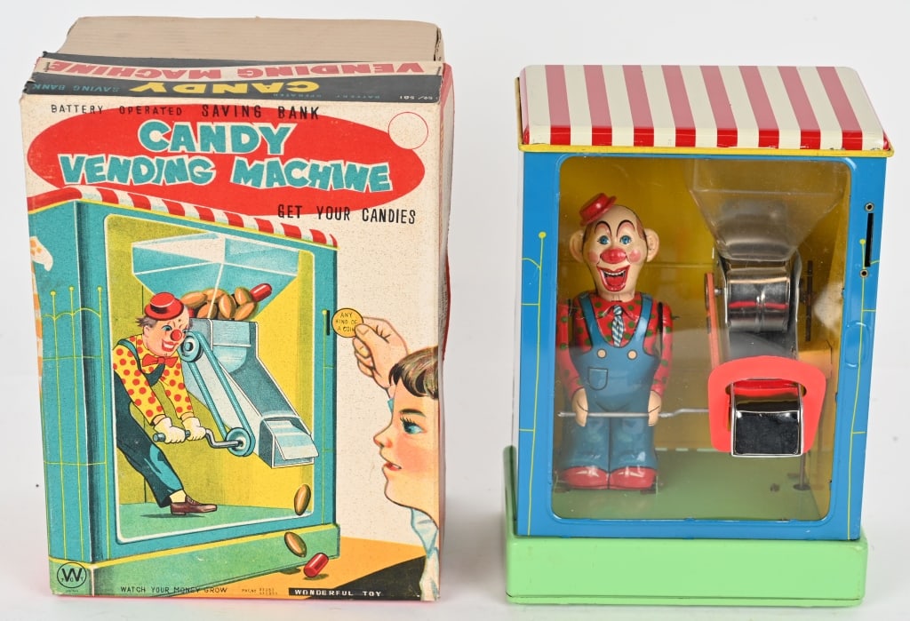 JAPAN BATTERY OP CANDY VENDING MACHINE BANK w/BOX: Japan battery operated Candy Vending Machine Bank. All original in great condition. Clean battery box. Worked when tested. Comes with original box. 10" Excellent