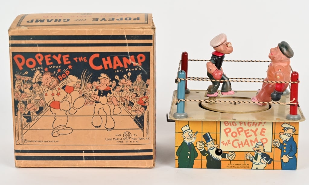 MARX TIN WINDUP POPEYE THE CHAMPS w/ BOX: Marx tin windup Popeye the Champs. All original and looks never played with condition. Toy has great colors and graphics. Both celluloid figures in great shape. Windup works. Comes with crisp Box with