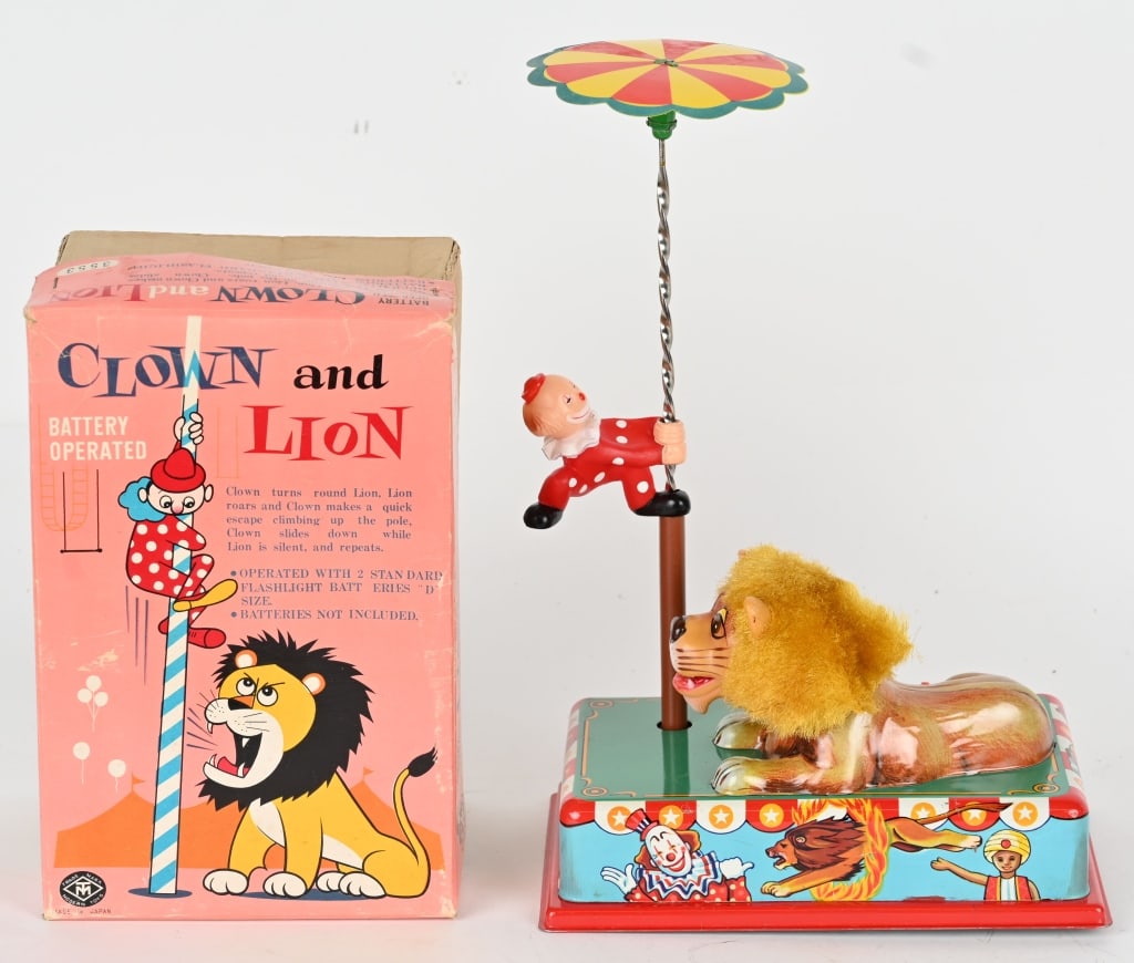 MT BATTERY OP CLOWN & LION w/ BOX: Japan battery operated Clown and Lion. All original and complete. Clean battery box. Worked when tested. Boxed 9 1/2" Excellent