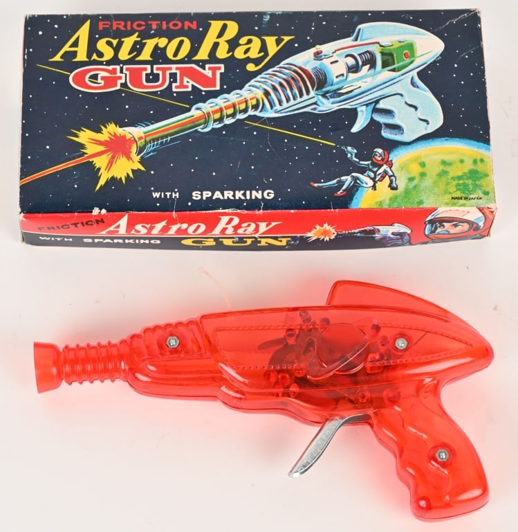 JAPAN FRICTION ASTRO RAY GUN w/ BOX: Japan friction Astro Ray Gun. All original and looks never played with condition. Still has antenna. Works, Sparks, and Tip Goes In and Out. Great looking Space Gun. Comes with crisp colorful Box with