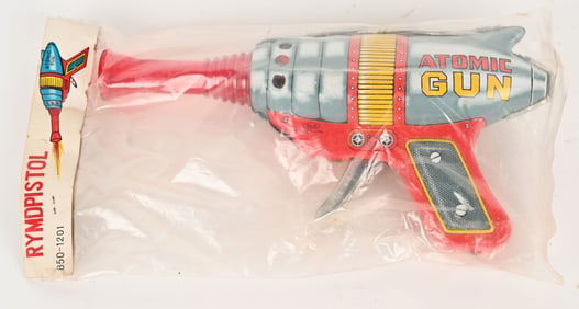 HAJI TIN FRICTION ATOMIC GUN MIP