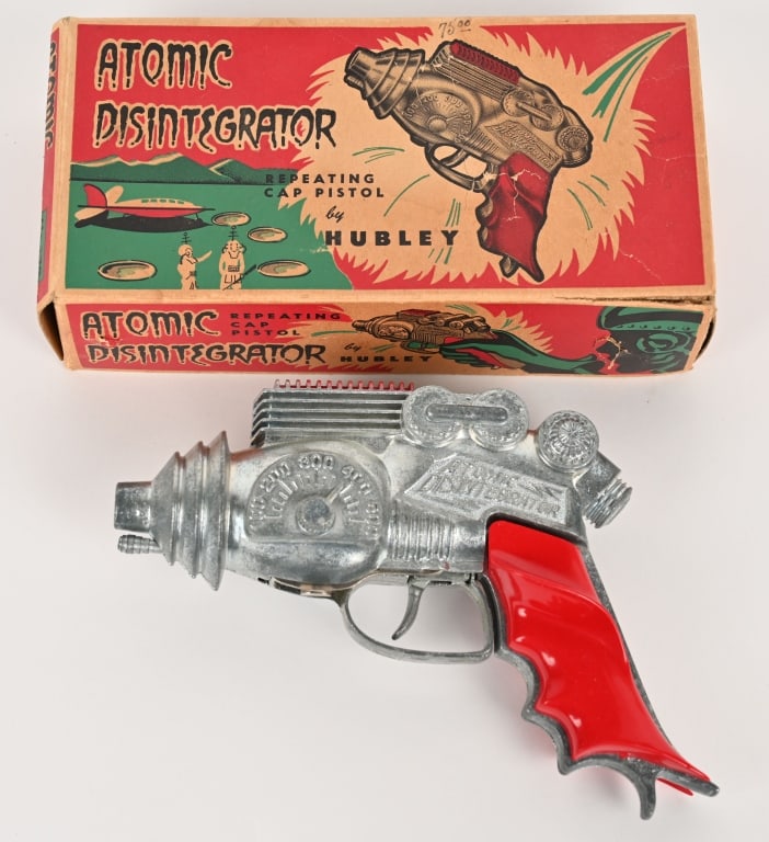 HUBLEY ATOMIC DISINTEGRATOR w/ BOX: Outstanding Hubley Atomic Disintegrator Cap Pistol. Looks like New Old Stock condition. Works. You won't find a better example of this Space Gun. With crisp Box. 8" Excellent
