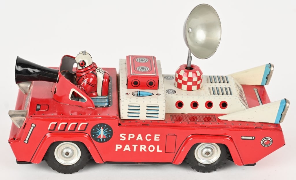 SANKIE TIN FRICTION SPACE PATROL: Japan tin friction Space Patrol. All original and complete with antenna. Car has great colors and details. Has full body Spaceman Driver. Friction works. Hard to find Space Toy. 7 1/2" Excellent