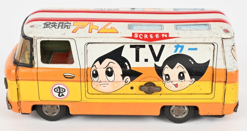 JAPAN TIN FRICTION MIGHTY ATOM TV VAN: Japan tin friction Mighty Atom / Astro Boy TV Van. All original with great colors and graphics. Has side door that opens and show TV screen with Mighty Atom fighting a Monster. Friction works and bell