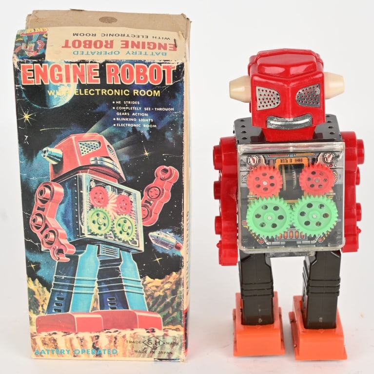 HORIKAWA BATTERY OP ENGINE ROBOT w/ BOX: Japan battery operated Engine Robot. All original and complete. Looks never played with condition. battery box is clean. Worked when tested. Comes with colorful Box and Inserts. 9" Excellent