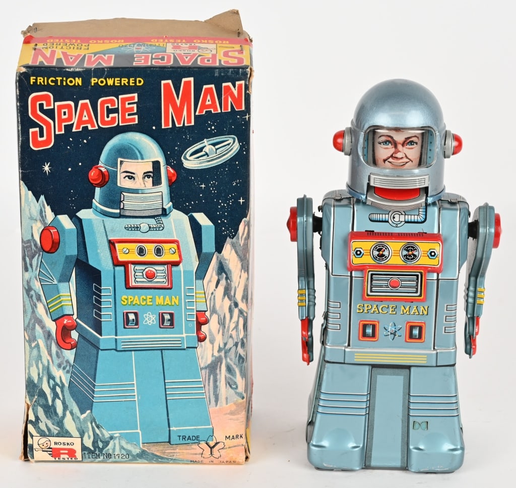 YONEZAWA TIN FRICTION SPACE MAN w/ BOX: Japan tin friction Space Man. All original and complete. Looks basically never played with. Has working crank friction in back. Great looking Robot. Comes with Box that has small tear in corner.10" Ex