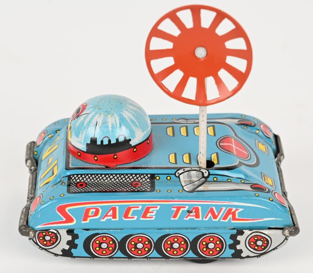 JAPAN TIN FRICTION V-17 SPACE TANK: Japan tin friction V-17 Space Tank. All original and complete with antenna. Has nice colors and graphics. Friction works. 4" Excellent