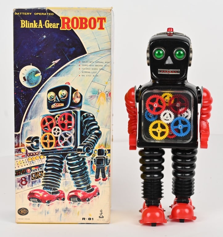 TAIYO BATTERY OP BLINK-A-GEAR ROBOT w/ BOX: Japan battery operated Blink-A-Gear Robot. All original and complete. Tin and plastic construction. Battery box is clean. Worked when tested. Plastic chest clear cover is crooked in the body. Looks li