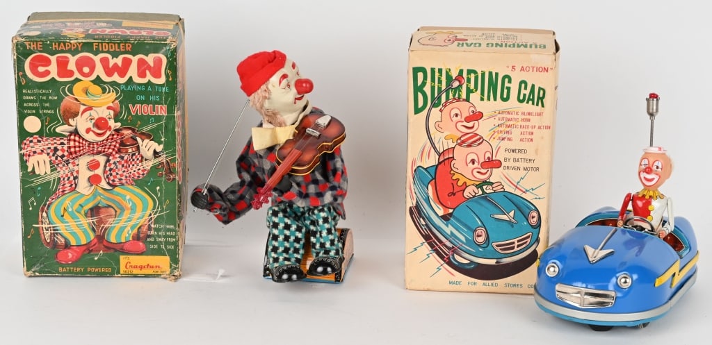 CLOWN BUMPING CAR & CLOWN VIOLINIST w/ BOXES: Japan battery operated Clown Bumping Car and Clown Violinist. Both all original in nice condition. Both worked when tested. Both with Boxes. Largest 10 1/2" Excellent