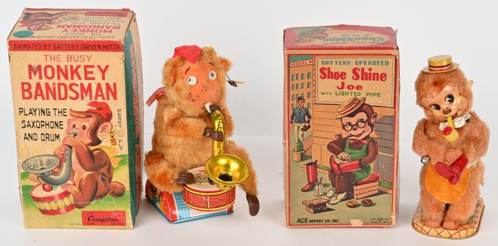 SHOE SHINE JOE MONKEY & MONKEY BANDSMAN: Japan battery operated Shoe Shine Joe Monkey and Monkey Bandsman. Both all original in nice condition. Both worked when tested. Both with Boxes. Largest 10" Excellent