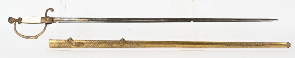 AMES US MILITIA STAFF OFFICER’S SWORD W SCABBARD: The Indian Princess pommel was a popular American form that lasted from about 1835 into the 1870s, at least in the catalogs of Ames and Horstmann. From the blade etching on the obverse ricasso, “