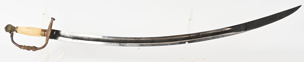 EARLY KNIGHT HEADED POMMEL WITH IVORY GRIP SWORD: Early. Knight Headed Pommel with a bone handle sword measuring 35 inches overall with a 29 inch, curved blade. The D Guard has Coats of Arms to each side. with a half clamshell handguard with an Ameri