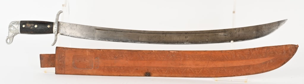 U.S. COLLINS & CO. ELEPHANT POMMEL MACHETE SHEATH: U.S. Collins & Co. No.376 Elephant pommel machete to include the original scabbard. Cutting edge is 21 3/4" long and 26 1/2 " Total Length. Excellent.