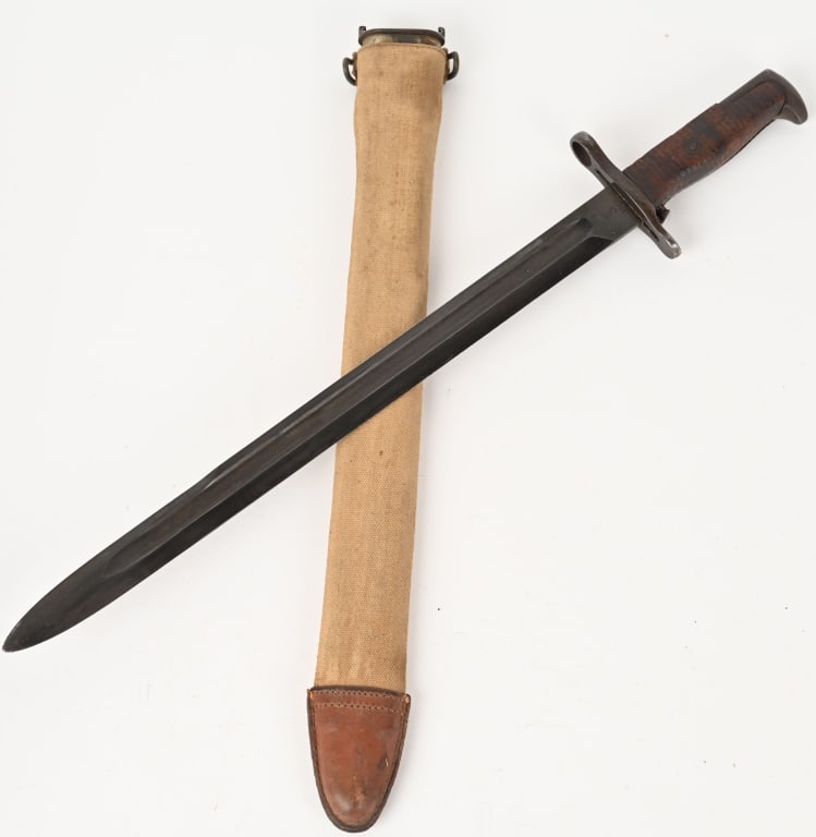 WWI M1905 SPRINGFIELD ARSENAL BAYONET & SHEATH WW1: 20 1/2" overall, nicely marked blade dated 1917 and serial numbered 707146, The canvas covered scabbard is marked to the reverse W.R. Colby. Excellent.