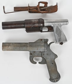 LOT OF 2 FLARE GUNS AND ANTIQUE BOOBIE TRAP