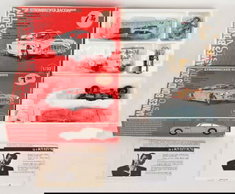 2- STOMBECKER JAMES BOND ASTON MARTIN SLOT CARS