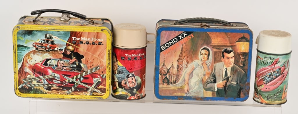 MAN FROM UNCLE & BOND XX LUNCH BOX: 1966 The Man From UNCLE Lunch Box with Thermos in nice condition. Bond XX Secret Agent Lunch Box with edge wear. Plus James Bond 007 Thermos.