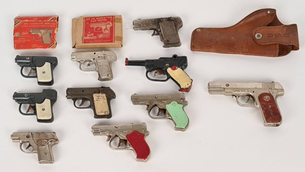 10- CAST IRON AUTOMATIC CAP GUNS: includes US Army 45, Presto, Boarder Patrol, 25-50, Rex, Dick, 25 Jr Repeating with Box, and More. All nice original condition. Largest 10" AS-IS