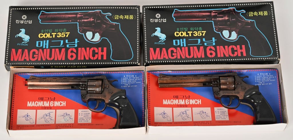 2- COLT PYTHON MAGNUM 357 CAP GUNS w/ BOXES: Both metal and all original in nice shape. Boxed 10" Excellent