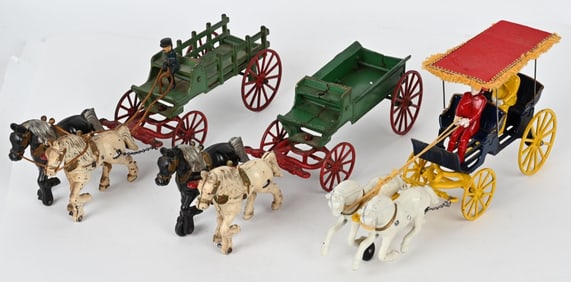 3- KENTON CAST IRON HORSE DRAWN WAGONS