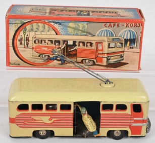 GUNTHERMANN TIN WINDUP MAN GETTING ON BUS w/ BOX