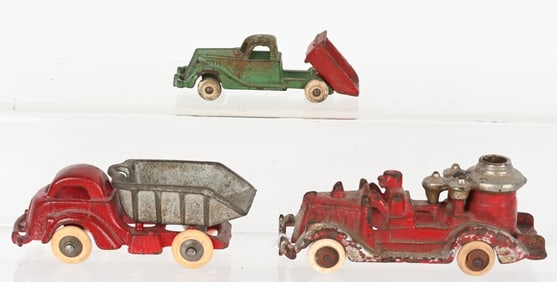 3- HUBLEY CAST IRON TRUCKS