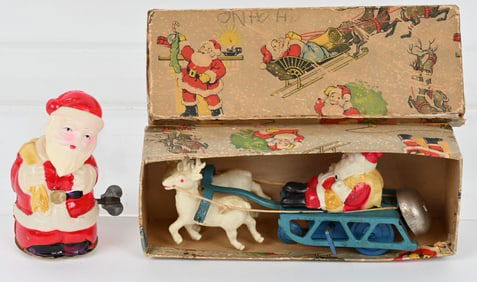 2- JAPAN CELLULOID WINDUP SANTA CLAUS TOYS