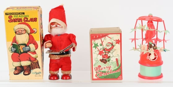 2- JAPAN WINDUP SANTA CLAUS TOYS w/ BOXES