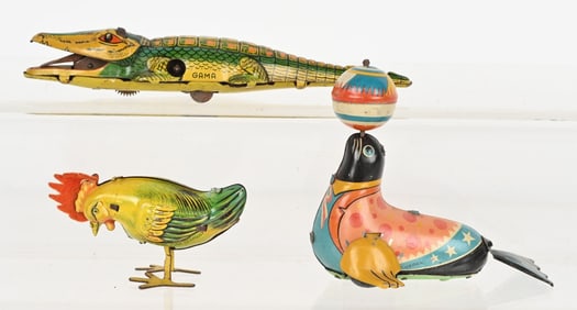 3- ANIMAL TIN TOYS