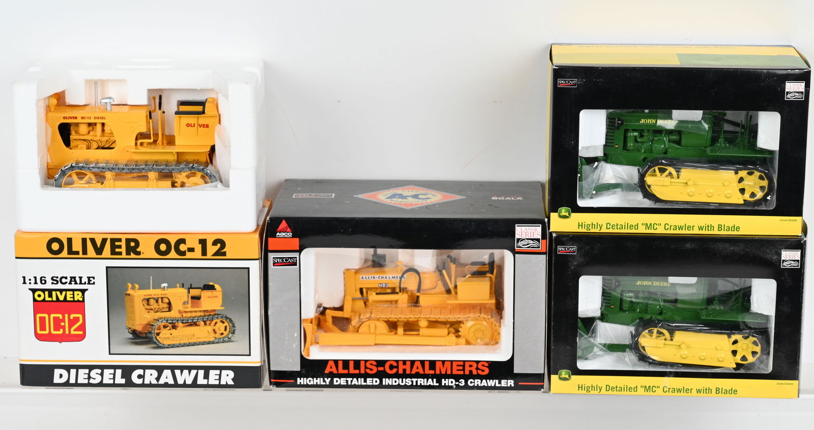 4- SPEC-CAST 1:16 CRAWLERS MIB: Includes Spec-Cast 1:16 scale Oliver OC-12, 2- John Deere MC Crawler with Blade, and Allis Chalmer HD-3 Crawler. All new in Box
