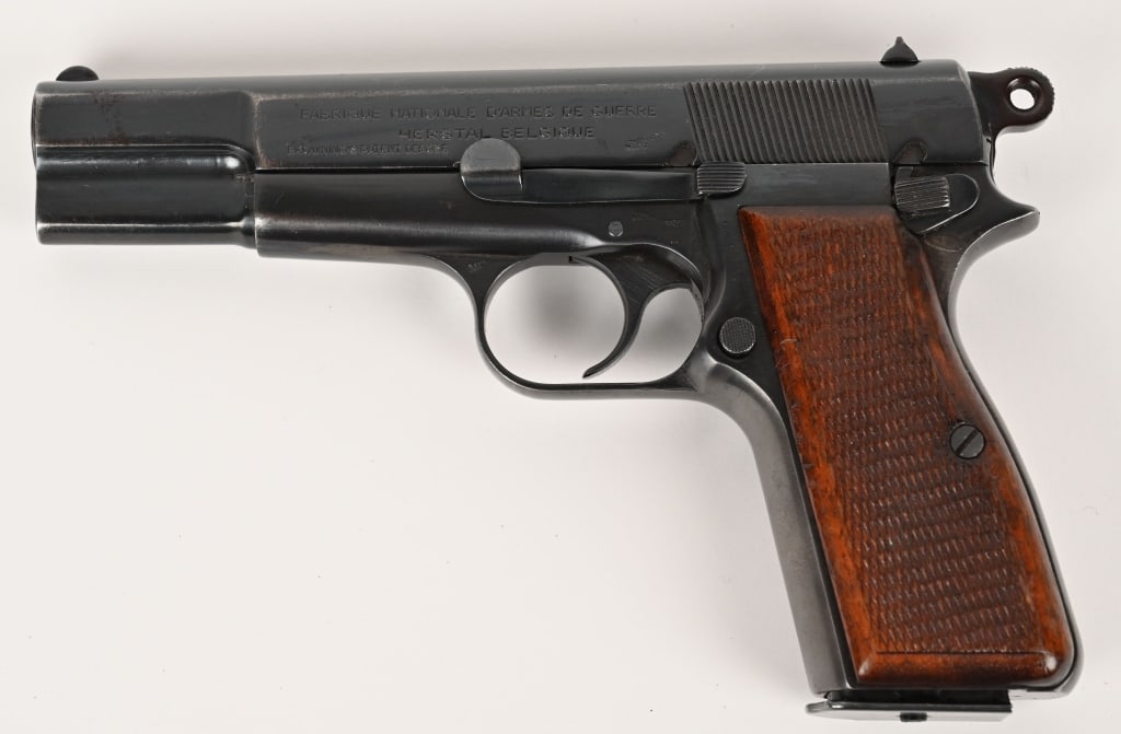 GERMAN INSPECTED WWII FN HIGHPOWER 9MM PISTOL: SERIAL NUMBER: 10981a. BARREL: 4 5/8". CALIBER: 9MM. MANUFACTURED: 1943. Produced in occupied Belgium at Fabrique Nationale Herstale. FN High Power P-35 9mm. Matching numbers on frame, slide and barre