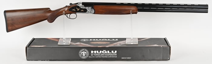 HUGLU MODEL 103 F OVER & UNDER 12 GA. SHOTGUN.