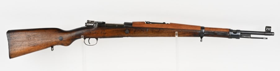 YUGOSLAVIA M 24/47 BOLT ACTION RIFLE 8X57 MM: SERIAL NUMBER: A6552 BARREL: 23 1/2" CALIBER: 8X57 MM MANUFACTURED: 1930-1950 Metal is blue finish with hooded ramped front sight and 2000 meter leaf rear sight. yugo crest is stamped on top of the re