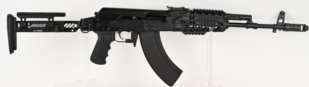 RUSSIAN SAIGA AK-47 BY IZHMASH SEMI-AUTO 7.62X39: SERIAL NUMBER: 13401883 BARREL: 16" CALIBER: 7.62 X 39 MM MANUFACTURED: 2000's Imported by RWC Group LLC. Metal is black coated with standard style sights. Krebs custom guns rail system AK-U.F.M. is m