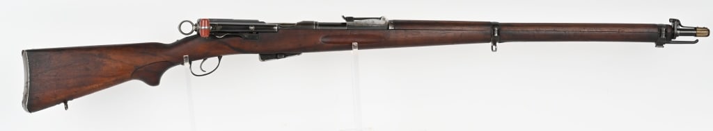SCHMIDIT RUBIN 1896 / 11 RIFLE 7.5MM SWISS: SERIAL NUMBER: 463954. BARREL: 30". CALIBER: 7.5X55 SWISS. MANUFACTURED: 1899. Swiss proofs on the chamber. Imported by P.W. Arms. Matching serials on the barrel, receiver, bolt and magazine. Later Sw
