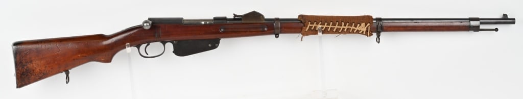 M-1888 / 90 MANNLICHER STRAIGHT PULL RIFLE 8X50R: SERIAL NUMBER: 7197 Q BARREL: 30 1/4" CALIBER: 8 X 50R MANUFACTURED: 1899-1901. Metal is blue steel with blade front and tangent style 1800 meter rear sight . Hardwood stock with steel butt plate and