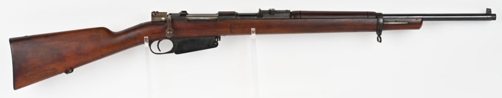 MAUSER MODELO ARGENTINO 1891 BOLT ACTION 7.65MM: SERIAL NUMBER: M5299 BARREL: 24" ( CUT DOWN ) CALIBER: 7.65 MM MANUFACTURED: 1895 Metal is blue steel with blade type front sight and 2000 meter ladder style rear sight. Stock is oil finished hardwood