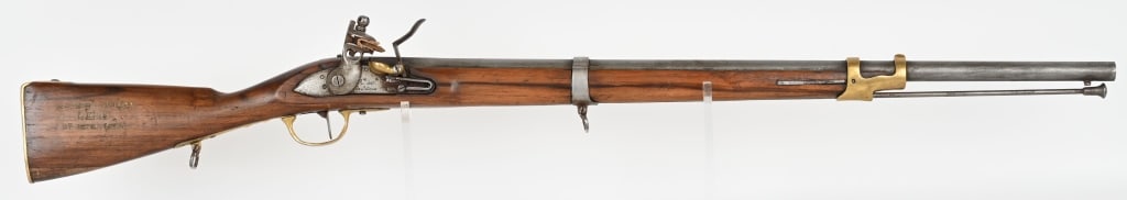 FRENCH ST. ETIENNE FLINTLOCK MUSKETOON: SERIAL NUMBER: NSN, BARREL: 31", CALIBER: .69, MFG: Early 19th century. Designed for cavalry use, this musketoon features brass hardware, 2 sling swivels, long sling bar, and one piece walnut stock . 