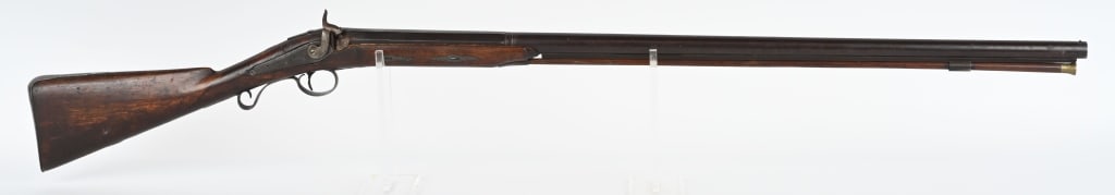 BACK ACTION LONDON PERCUSSION FOWLER: BARREL 36.5". GAUGE 12. Walnut checkered half stock, octagon to round barrel engraved back lock action & hammer, British proofs on barrel as well as stamped London. Condition. Clean smooth patina. woo