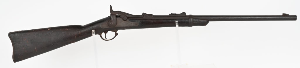 US MODEL 1873 TRAPDOOR SPRINGFIELD RIFLE: SERIAL NUMBER: 95664. BARREL: 22". CALIBER: 45-70. Model 1873 Trapdoor Springfield rifle that has been altered to carbine size. Lock is marked "US SPRINGFIELD" with eagle in center. Breech block is ma