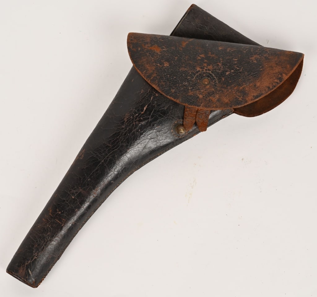 CIVIL WAR J.J. PITTMAN NEW YORK REVOLVER HOLSTER: Nice original Civil War J.J. Pittman flap holster. The holster is in solid condition. The closure strap has a tear and the plug is missing. Better condition than most seen. Fits large frame Colt and R