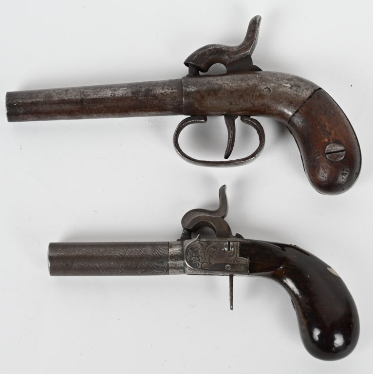 LOT OF TWO 32 CALIBER ANTIQUE PERCUSSION PISTOLS: BELGIAN GUILD ELG 32 CALIBER PERCUSSION PISTOL SERIAL NUMBER: NSN. BARREL: 2". CALIBER: .32. This percussion pistol features a Damascus barrel, highly unique floral pattern engraving and wood grips. T
